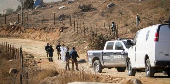 Hallan cuerpo parcialmente calcinado en un camino de terracería